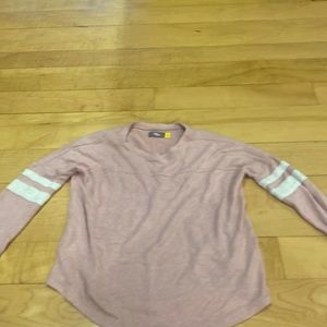 Pink sweater stripes on arms